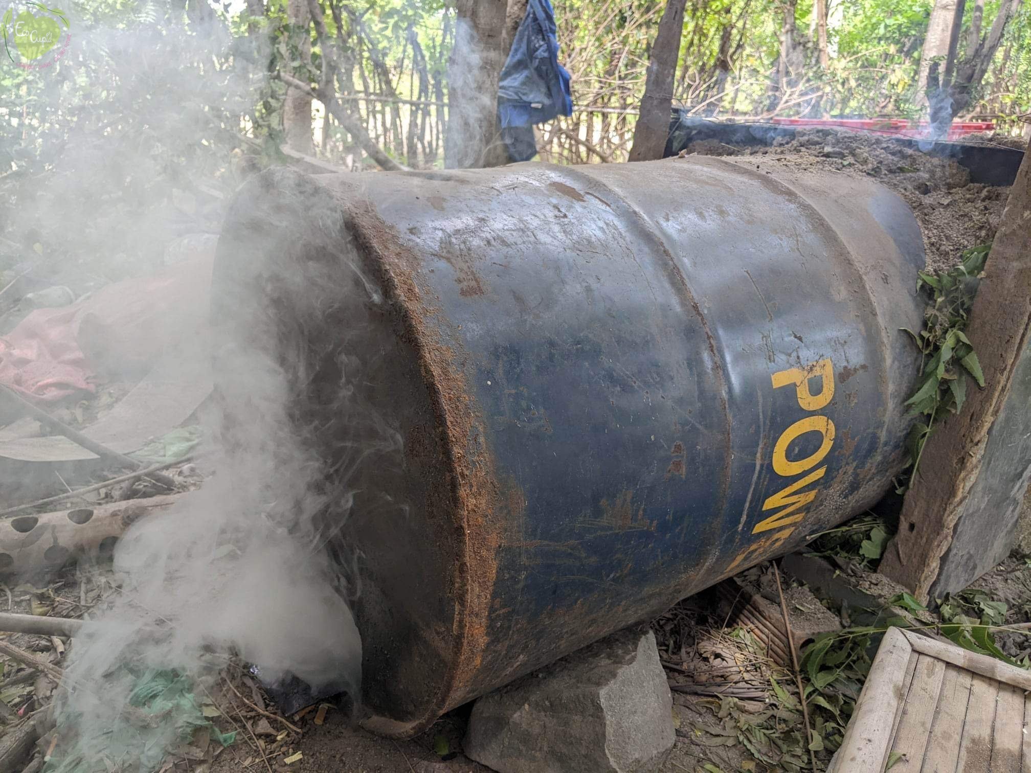 Mr Jaka used to use barrels to make charcoal before he realised the great benefits of traditional charcoal making. (Mr Jaka)