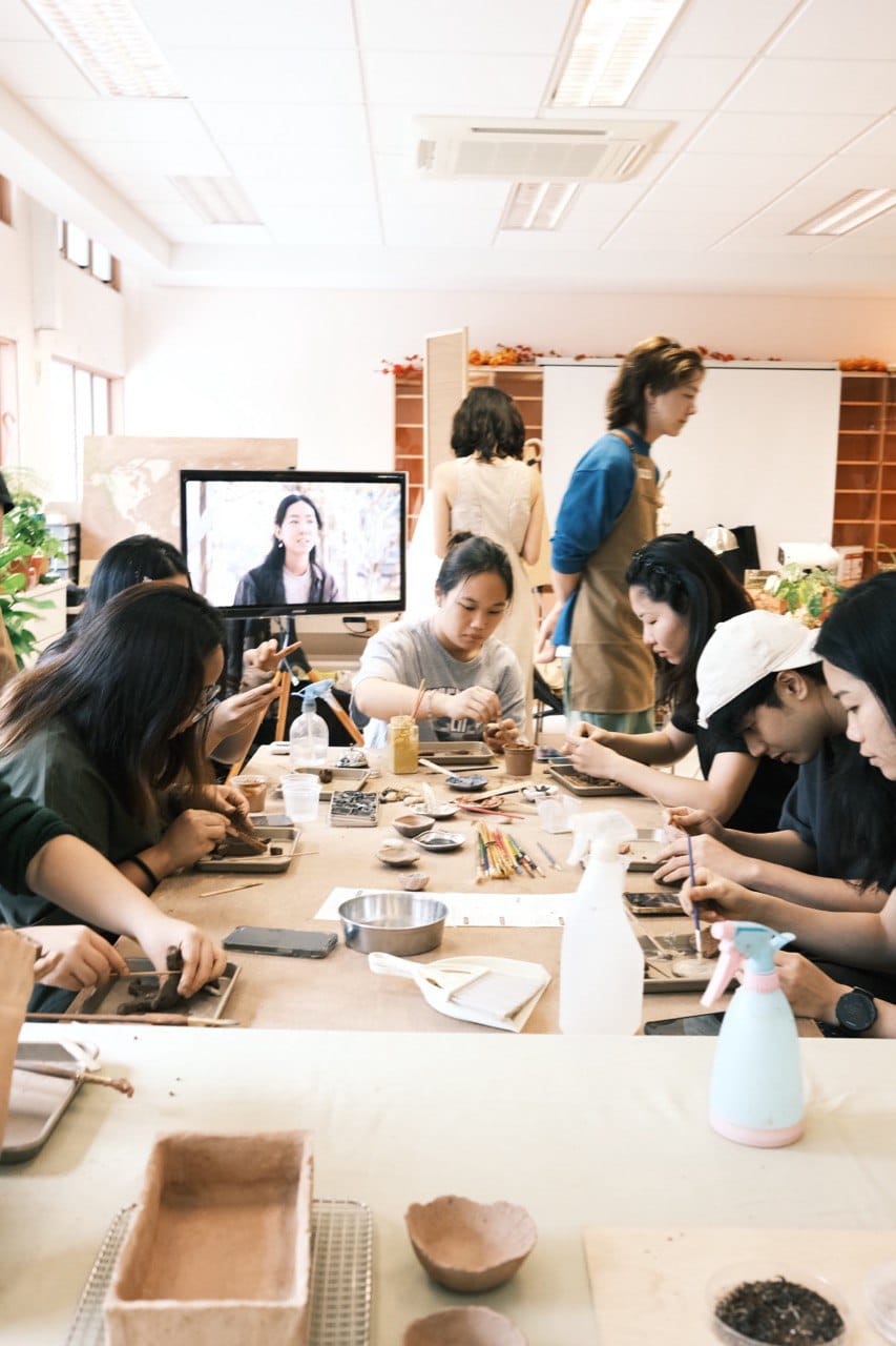 Participants mould with ferticlay at a workshop in the company’s former studio. Photo courtesy of Jodie Monteiro-Ferticlay.