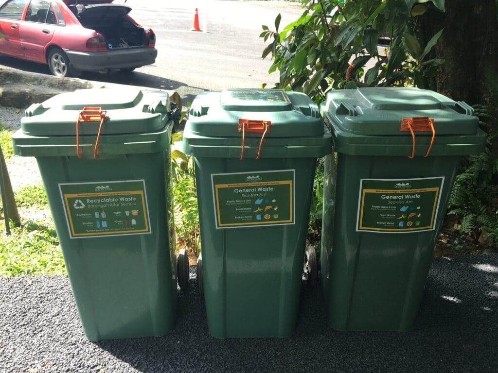 ANP’s monkey-proof latches fitted onto community bins. Photo courtesy of Animal Neighbours Project.